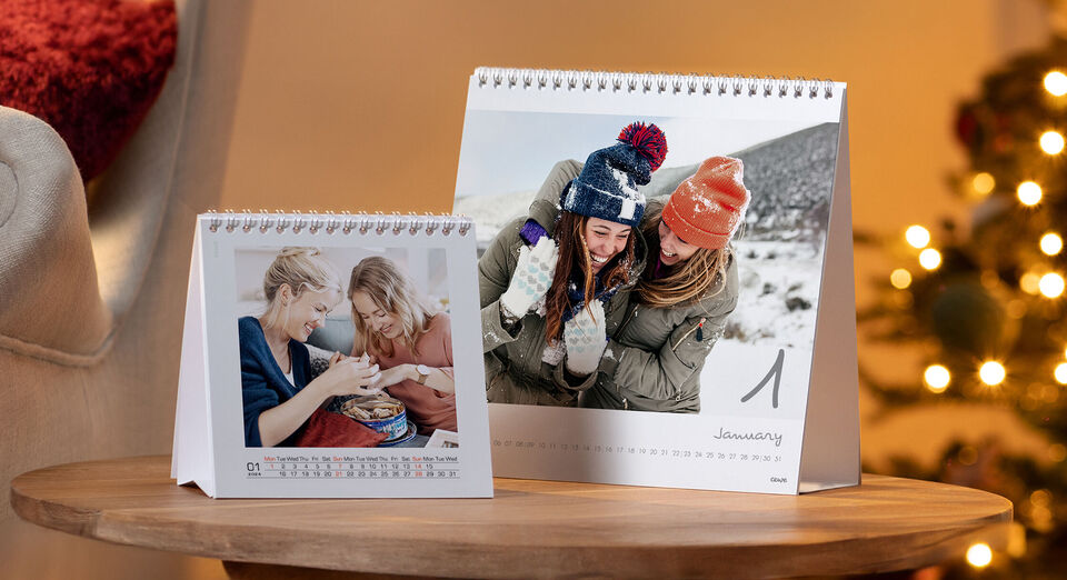 Personalised square desk calendar with images of kids jumping off pantoon