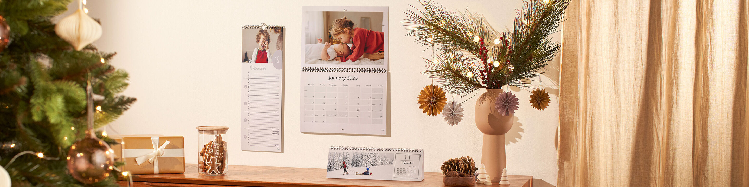 Selection of small to large photo calendars hanging on the wall